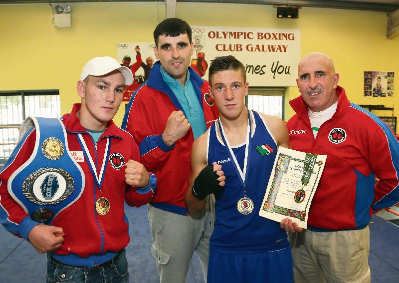 Olympic Boxing Clubs James Cleary (left) and Frankie Cleary with their coaches Michael and John Mongan.