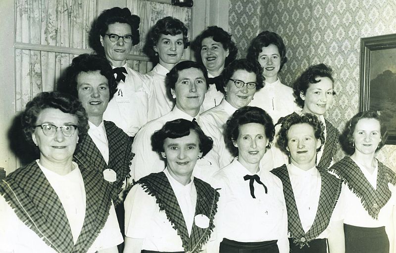 Loughrea ICA gathering during the 1950s: Back: M. Cusack, C. Hanbury, L. Jennings and B. Hennigan. Middle: Mrs. Heary, Mrs. Devine, Mrs Corry and N. Dunn. Front: Mrs. Hanbury, Mrs. Fahy, Mrs. Hession, Mrs. Hope, and T. Barry.