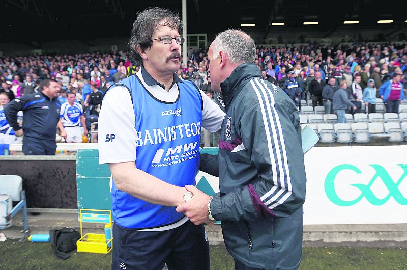 Laois manager Seamus Plunkett congratulates his Galway counterpart Anthony Cunningham after their 2014 Leinster hurling championship clash. The teams will meet for the third year in a row in Tullamore on Saturday evening.