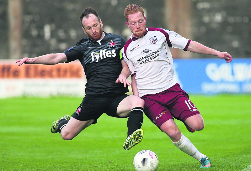 Galway United's Ryan Connolly in a race for possession with Dundalk FC's Stephen O'Donnell during Tuesday's Premier Division tie at Eamonn Deacy Park. Photos: Joe O'Shaughnessy.