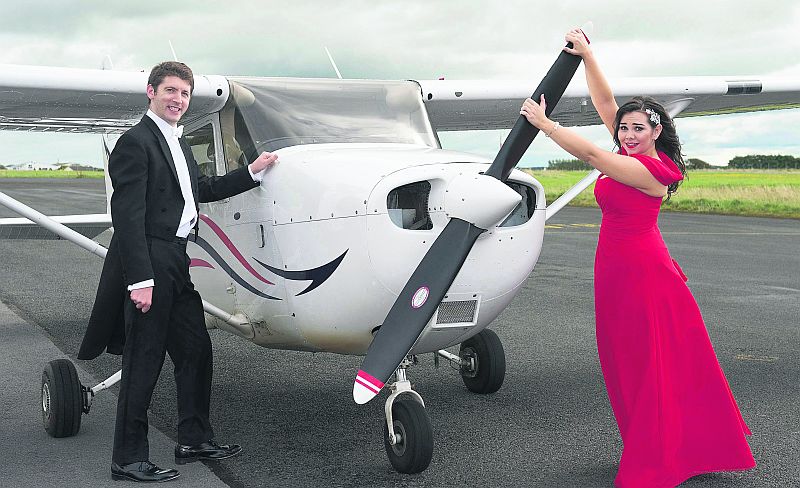 Plane sailing: Soprano Rachel Croash and Music for Galway Artistic Director Finghin Collins take to the air ahead of the launch of Music for Galway's new season 'On wings of song' at the Meyrick Hotel on Monday evening. Photo: Andrew Downes.