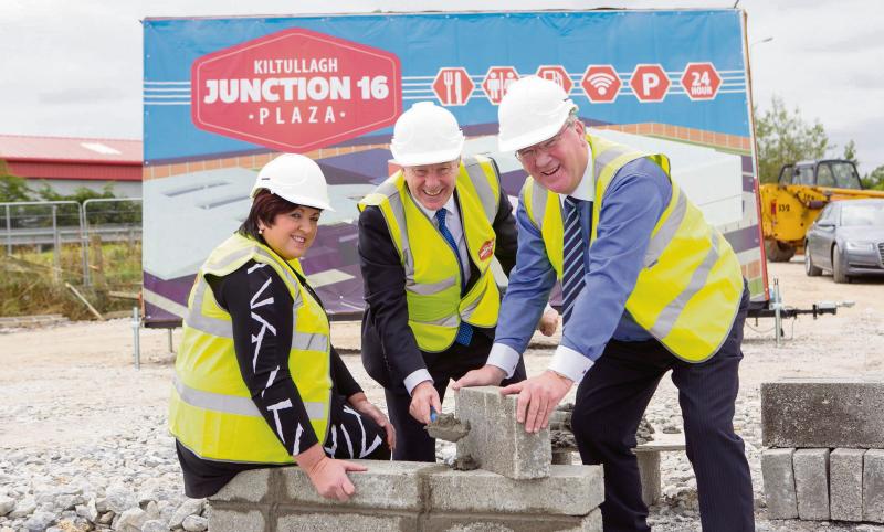 Junior Minister Michael Ring lays the first block of the Junction 16 Kiltullagh Plaza on the M6 with Pat and Una McDonagh. The motorway service station will create 100 jobs locally, from 320 jobs announced by Pat and Una McDonagh at three motorway service stations nationwide over the next two years.