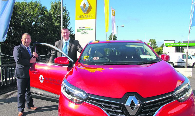 Enda Cantrell and Ray Cafferkey of Bradley Renault with the new Renault Kadjar just arrived at their showrooms on the Tuam Road, Galway.
