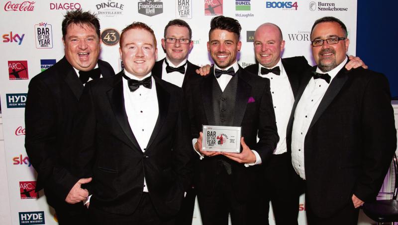 Shay Livingstone, Philip Duignan, Tom Joyce, Dough Leddin, Cyril Briscoe and Johnny Duggan of An Púcán celebrate wiinning the Connacht Bar of the Year at the Sky Bar of the Year Awards.