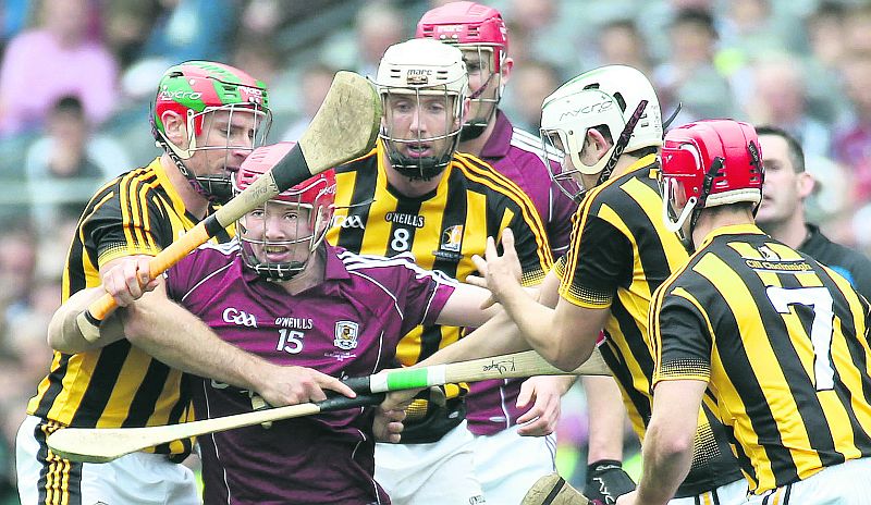 OUTNUMBERED: Galway's Cathal Mannion has nowhere to go as he is surrounded by Kilkenny's Kieran Joyce, Michael Fennelly, Padraig Walsh and Cillian Buckley in the second-half of Sunday's All-Ireland hurling final at Croke Park. Photo: Joe O'Shaugnessy.