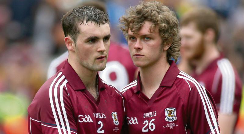 Galway defender Johnny Coen is consoled by squad memeber Brian Molloy after their loss to Kilkenny in the All-Ireland hurling final last Sunday week.