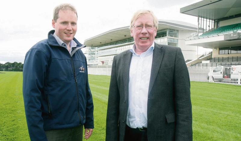 Michael Moloney, new General Manager of Galway Racecourse, pictured with his father John, who stepped down from the role after 27 years at the helm.