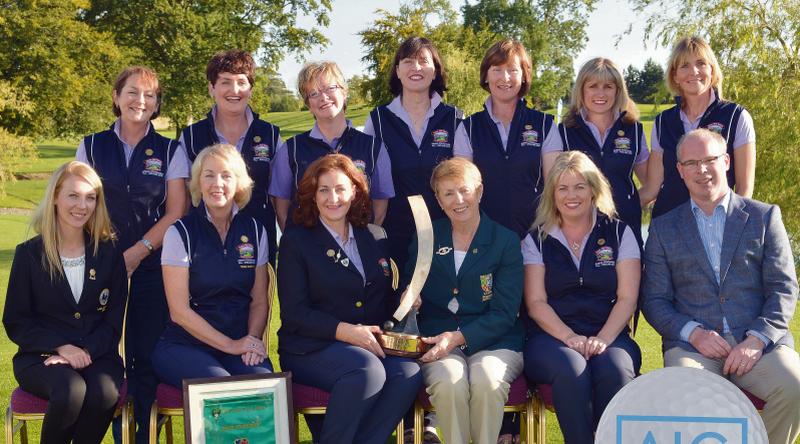 President of the Irish Ladies Golf Union, Valerie Hassett, presenting Marian Cunningham, Lady Captain of Bearna Golf Club, with the AIG Junior Foursomes trophy. Also in the picture are, back row, from left: team members Bridie McNamara, Tara Cunningham, Valerie Kiely, Mary Farrell, Barbara O'Keeffe, Caroline Codyre and Claire Cunningham (Team Vice Captain). Front: Elva Leavy, Lady Captain, Knightsbrook GC; Catherine Quinlan, team manager; Ailis McDermott; and Declan O'Rourke, general manager, AIG Ireland. Photo: Pat Cashman.