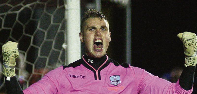 Conor Winn celebrates saving Sean Hoare's penalty in the EA Sports Cup final shoot-out. The United 'keeper can expect a busy night against Shamrock Rovers on Friday. Photo: Enda Noone.