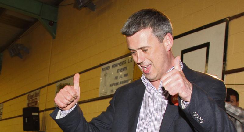 UP AND OVER . . . Colm Keaveney on learning that he had won an historic Labour seat in Galway East at his third attempt.