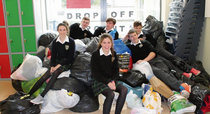 Achieving their goal . . . Third Year students at HRC Mountbellew who recently organised a 'Root for Refugees' collection in association with Goal, pictured with some of the donations they gathered for the collection.