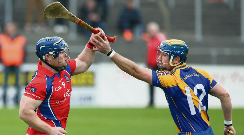 St Thomas' Bernard Burke tries to fend off the challenge of Loughrea's Emmet Mahony during Saturday's senior hurling quarter-final at Kenny Park. Photo: Joe O'SHaughnessy.