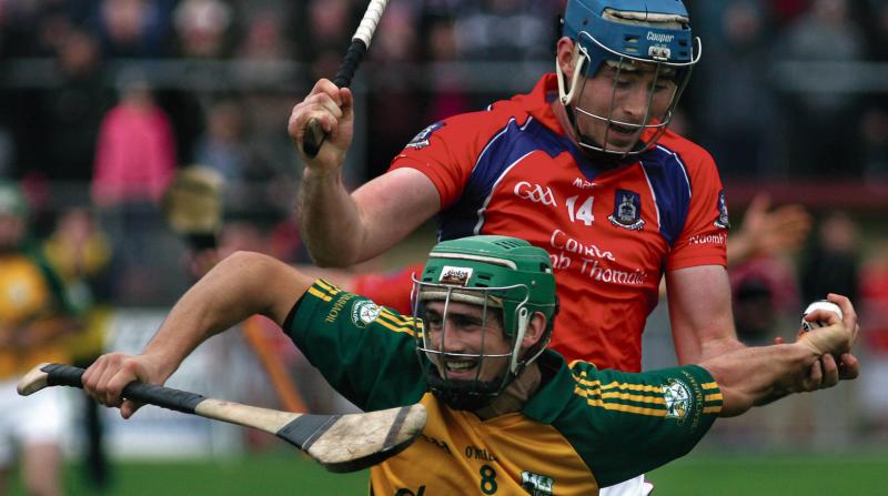 Craughwell's Niall Callanan comes under strong pressure from St.Thomas' Conor Cooney during Sunday's senior hurling semi-final at Kenny Park. Photo: Enda Noone.