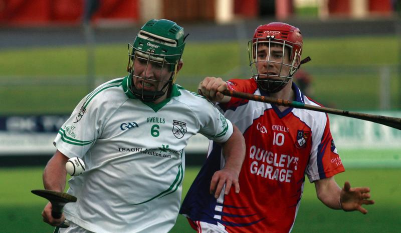 Moycullen's Mark Lydon is chased by Ahascragh-Fohenagh's Eoghain Delaney during the Intermediate hurling championship semi-final at Kenny Park on Saturday. Photos: Enda Noone.