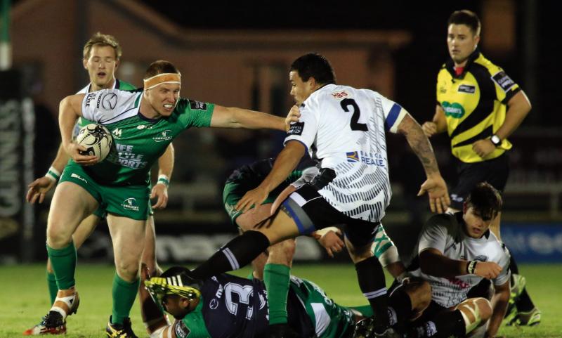 Connacht's Shane Delahunt hands off Andrea Manici of Zebre during Saturday night's Guinness Pro12 tie at the Sportsground. Photo: Joe O'Shaughnessy.