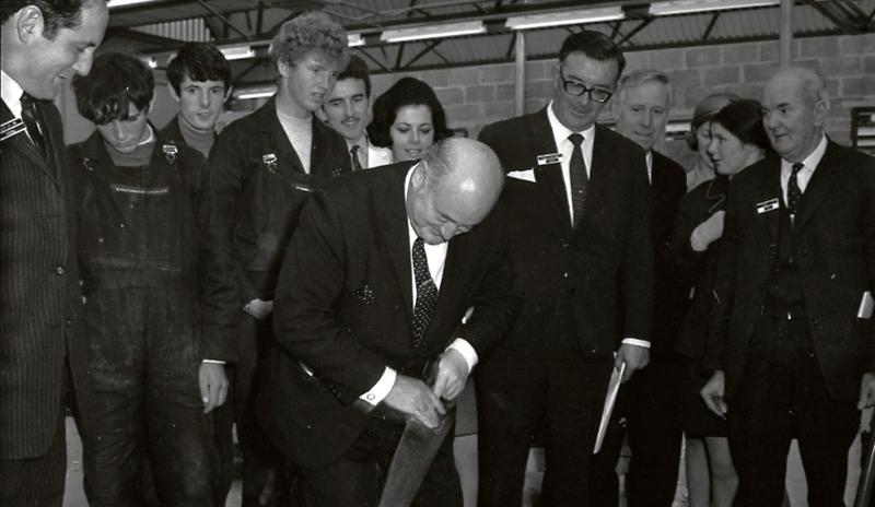 The Minister for Labour, Joseph Brennan, tries his hand at sawing after he performed the official opening of an adult training centre for the Industrial Training Authority (AnCO), at Galway Industrial Estate, Mervue, the third to be established in the country, in November 1969. The centre catered for 200 trainees in trades such as welding, machine tool operating, mechanical and electrical assembly work, radio and television servicing etc.
