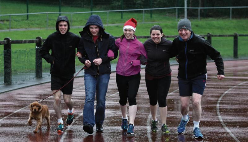 John Waldron, David Waldron and Coco, Ruth Waldron, Aishling Casey, and Brendan Waldron of Circular Road, taking part in the GOAL Mile on Christmas Day.