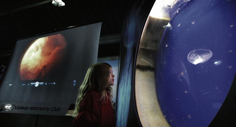 A pupil from Scoil Einne in Spiddal at the Galway Astronomy Club display at the Galway Atlantaquaria during Science week Ireland.