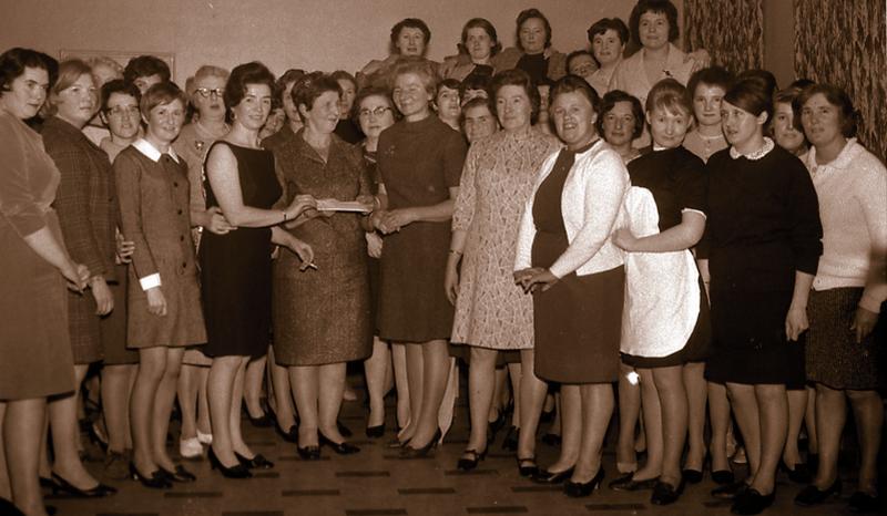Miss Jane O'Reilly, photographed with members of the staff of the Western Regional Sanatorium, Merlin Park, at a function in her honour to mark her retirement as matron of the hospital in January 1969.