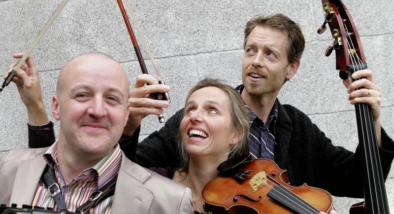 The Far Flung Trio: Dermot Dunne on accordion, Katherine Hunka on violin, and Malachy Robinson on double bass.