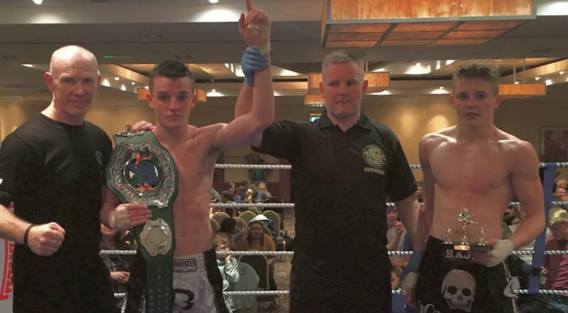 James Kelly from Athenry (second from left) after being crowned the new IKF All Ireland Super Lightweight K-1 Champion, pictured with coach Pete Foley, referee Paul Cummins, and defeated opponent Erik Hehir from Clonmel.