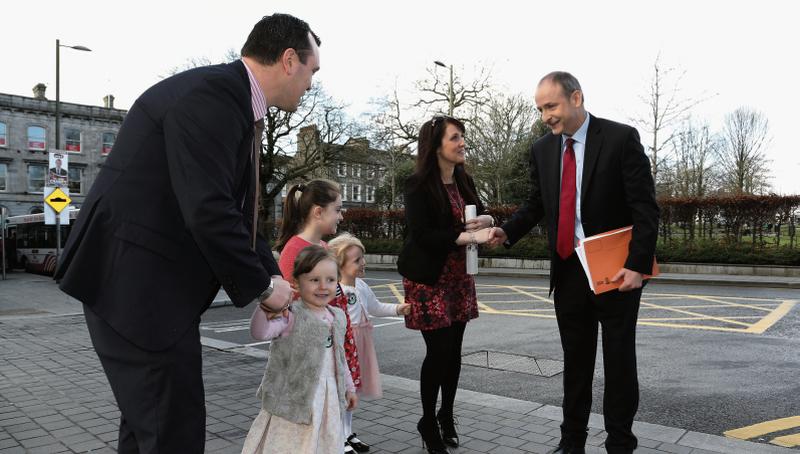 Fianna Fail leader Micheal Martin meets with Galway West Fíanna Fáil candidate Cllr John Connolly and his wife Bernadette and their daughters Sadie, Katie and Lauren, on his arrival at the Hotel Meyrick on Wednesday to launch the Fianna Faill plan for rural Ireland.