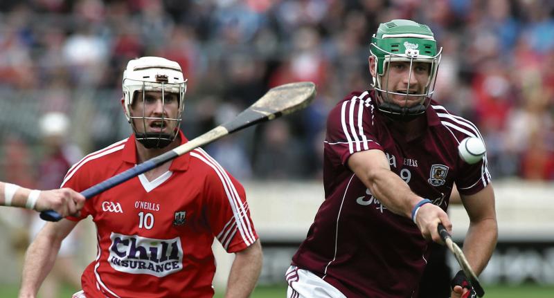 New Galway captain David Burke in action against Cork's Brian Lawton during last years All-Ireland quarter-final which the Tribesmen won easily.