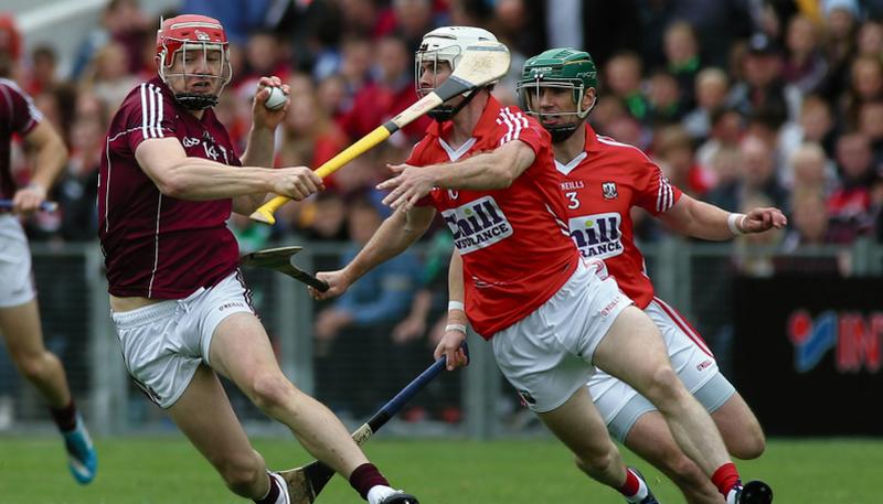 Galway's Joe Canning under pressure from Cork's Brian Lawton and Brian Murphy during last year's All-Ireland quarter-final at Semple Stadium.
