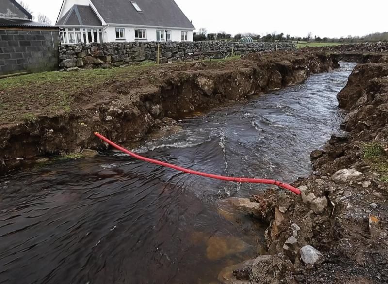 The simple channel dug out at Cahermore in the early days of January 2016, that helped to relieve an emergency flood situation for many homes in the area.