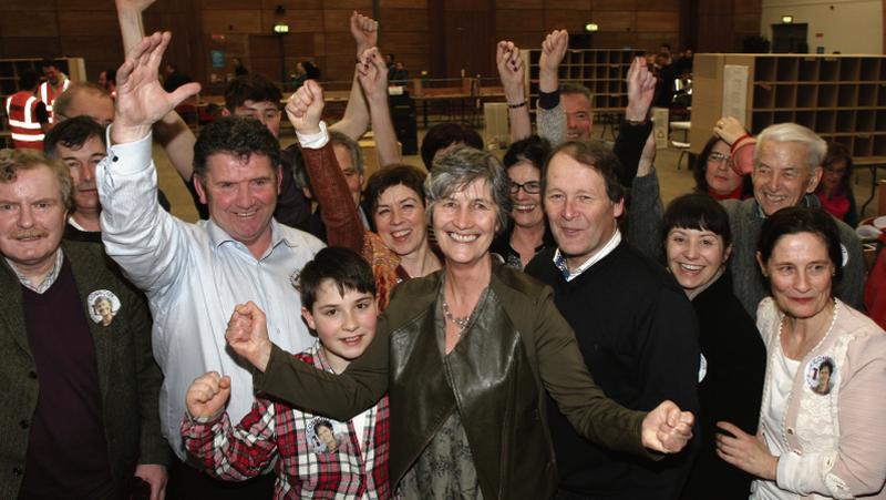 Cllr Catherine Connolly, Galway West independent candidate, celebrates with her husband Brian McEnery, family members and friends, after she was elected.