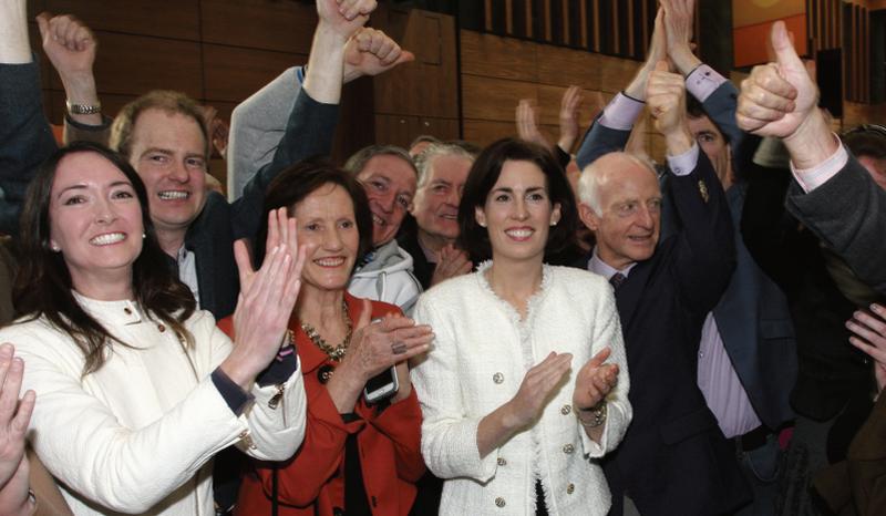 Fine Gael Galway West candidate Senator Hildegarde Naughton celebrates her election with her parents Marguerite and PJ and brother Derek (right), at the Bailey Allen Hall, NUI Galway.