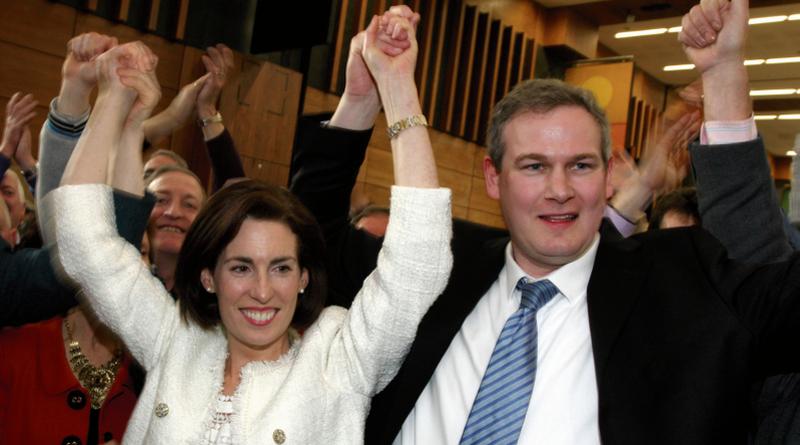 Hands up...Fine Gael candidates Senator Hildegarde Naughton and Sean Kyne celebrate after they were both elected on the 14th count for Galway West at the Bailey Allen Hall, NUI Galway. Photo: Joe O'Shaughnessy.