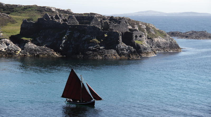 A Galway Hooker in Bofin Harbour, with Cromwell's Barracks in the background. Photos: Marie Coyne.