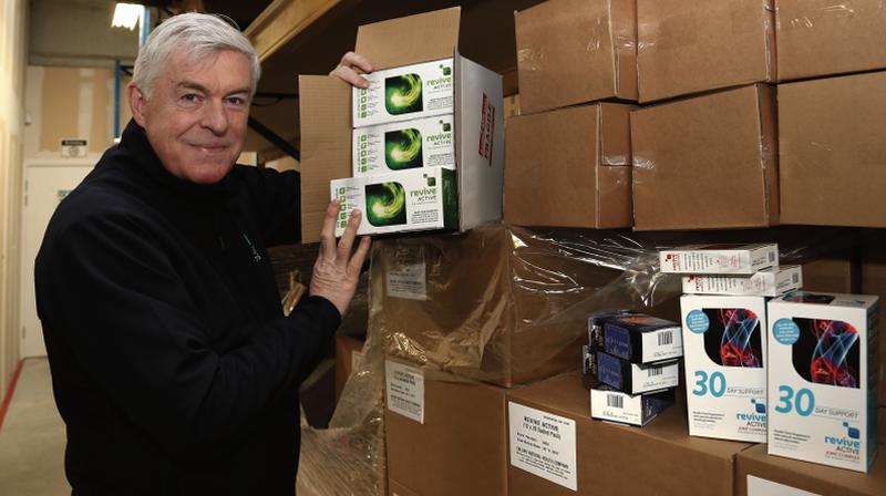 Daithi O'Connor, Managing Director, Revive Active, with products for shipping out from the warehouse. Photo: Joe O'Shaughnessy.