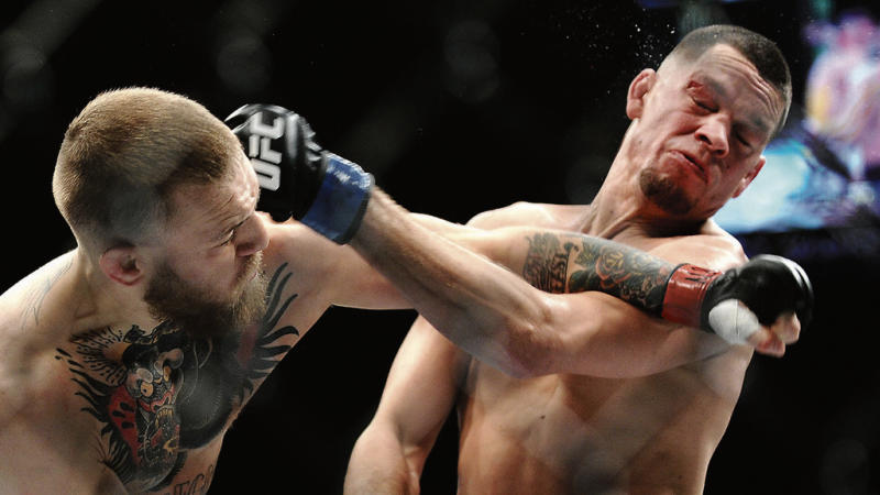 Gory stuff: Conor McGregor and Nate Diaz trade blows in Las Vegas during their recent fight.