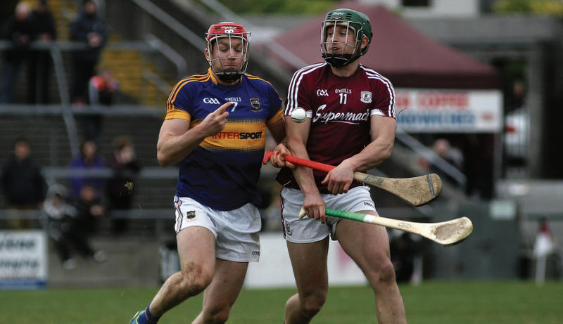 Galway's in-form Niall Burke, in action against Tipperary's Padraic Maher, scored a vital 1-3 in the Tribesmen's National League draw with Waterford in Walsh Park last Sunday.
