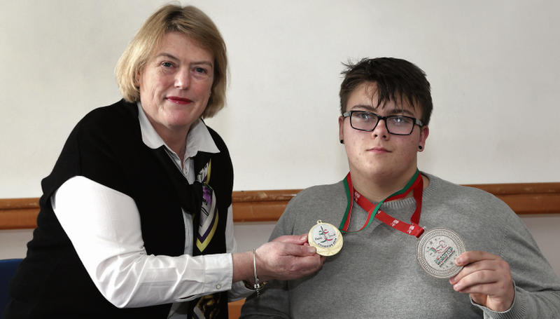 Galway's Jack Colbert, who became the first Irish Junior Para Powerlifter to win a World Cup event, is pictured with Colaiste Iognaid Principal Catherine Hickey.