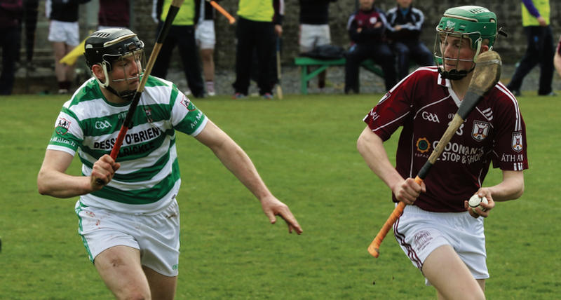 Athenry's Ian O'Shea is about to be challenged by Mullagh's Cathal Dervan during the clubs' Senior B championship tie at Duggan Park on Sunday evening. Photo: Joe Kease.