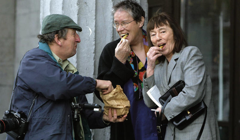 Nutan is rarely seen without a camera, as on this occasion during a Cúirt Literary Festival when he shared his chips with E Annie Proulx and Beryl Bainbridge. PHOTO: JOE O'SHAUGHNESSY.
