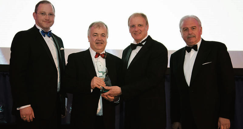 Padraic Rhatigan (second left), MD of JJ Rhatigan & Co, accepts the Contractor of the Year Award from Tom Moloney of sponsors CIS, joined by Fergal Lalor, Commercial Manager, JJ Rhatigan & Company, and Marty Whelan.