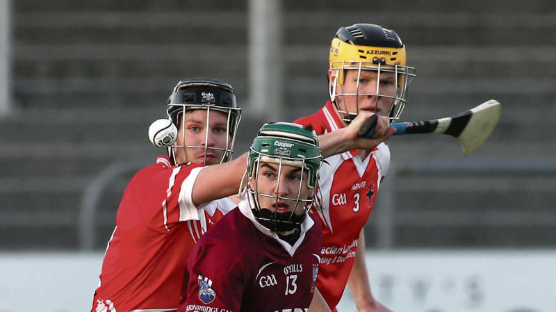 Clarinbridge's Evan Niland has Carnmore's JP O'Connell and Eoin Grealish in close attendance during the clubs' Senior B championship tie at Kenny Park last Friday evening. Photos: Joe O'Shaughnessy