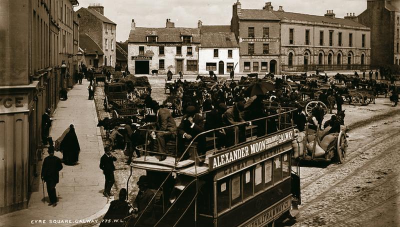 Eyre Square, Galway on a fair day probably in the 1880s. In the foreground is a horsedrawn tram setting off on the two-and-a-half-mile journey to Salthill. Operated by the Galway and Salthill Tramway Co, the tramline opened in 1879. The advertising board on the top level of the tram refers to Alexander Moon General Draper which operated for over a century in the city, latterly simply as Moons, before being taken over by Brown Thomas in 1995.