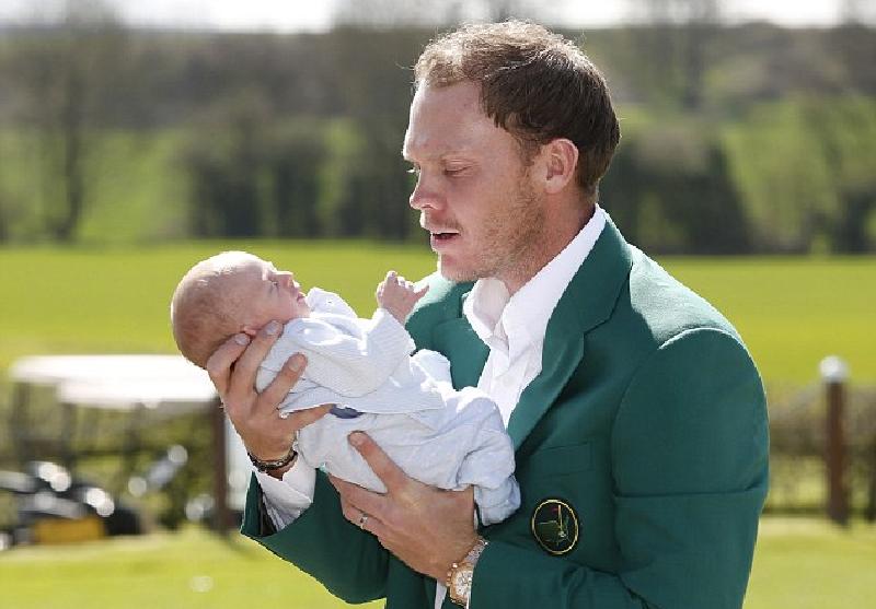 Danny Willett with his son who was born 11 days before he clinched the Masters - a harbinger of sporting success