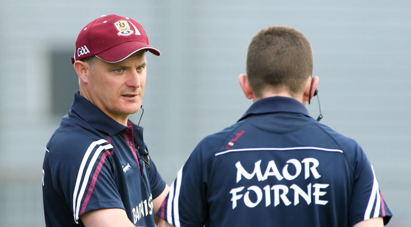 Galway team manager Michéal Donoghue in discussion with selector Francis Forde during their convincing Leinster championship victory over Westmeath on Sunday. Photos: Joe O'Shaughnessy.