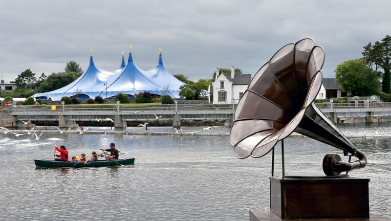 WATER MUSIC . . . Donnacha Cahill’s pop–up audio visual sculpture, The Gramophone, stands beside the corrib at Woodquay as part of Galway International Arts Festival which finished last weekend. Photo: Joe O'Shaughnessy.