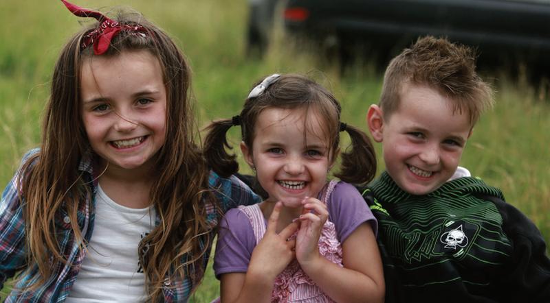 Holly, Ashley and Josh Maher from Loughrea in a happy mood at the Loughrea Agricultural Show last Sunday. PHOTO: HANY MARZOUK.