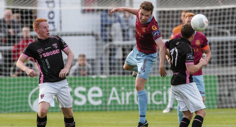 Galway United's Conor Melody winning this aerial battle against Wexford Youths in Friday night's Premier Division tie at Eamonn Deacy Park. Photos: Joe O'Shaughnessy.