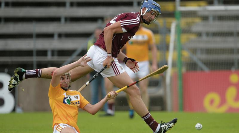 Galway's Cian Salmon getting the better of Antrim's Conor Carson during Saturday's All-Ireland Minor hurling quarter-final at Breffni Park. Photos: Oliver McVeigh/Sportsfile