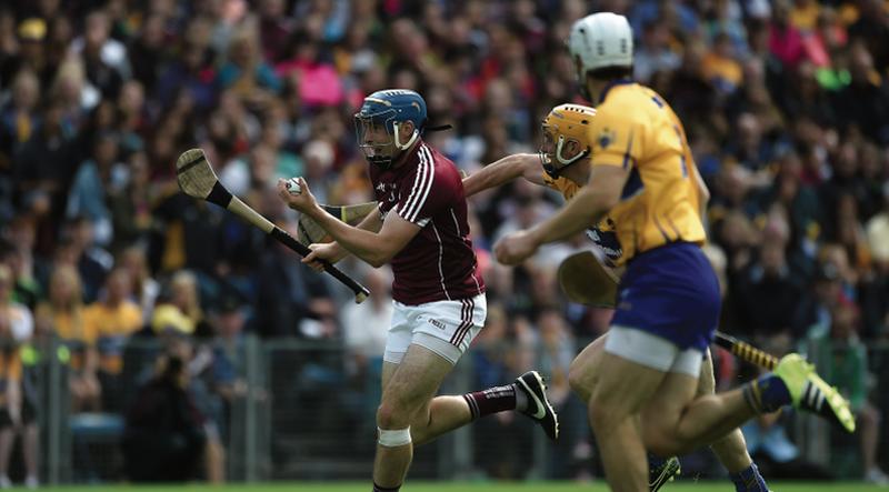 KEY MOMENT: Galway's Conor Cooney breaks away from Cian Dillon of Clare on his way to scoring his side's first goal during Sunday's All-Ireland quarter-final at Semple Stadium. Photo: Daire Brennan/Sportsfile