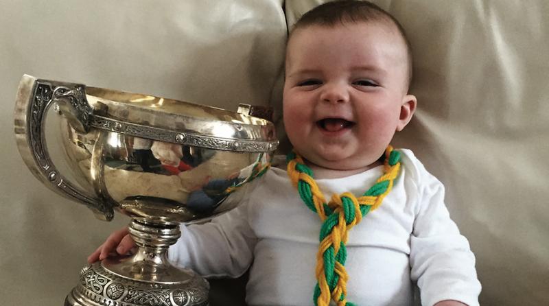 Six month old Mícheál McDermott from Gort admiring the Guaire Cup, at the launch of this year's competition - the final of which takes place between Gort and Craughwell this Saturday at Gort GAA Grounds.